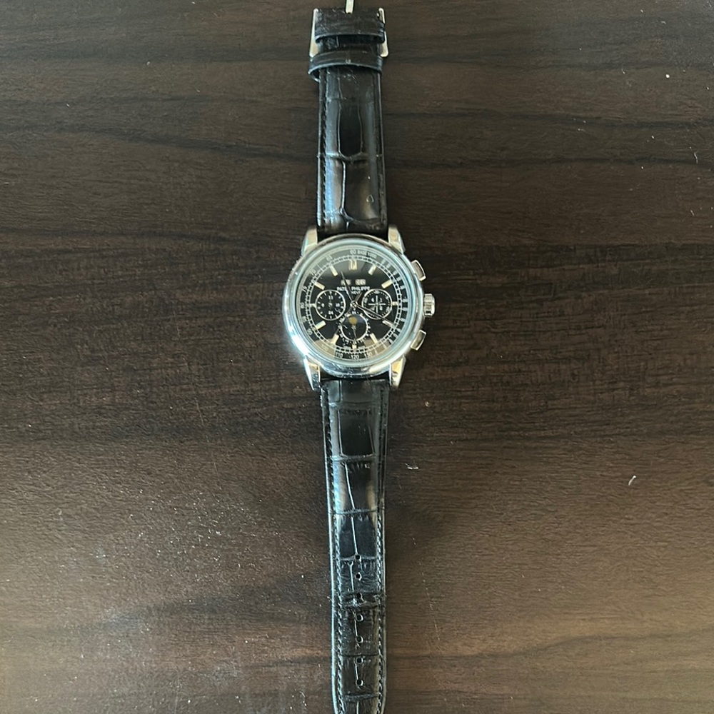 Patek Philippe Black and Silver Watch
